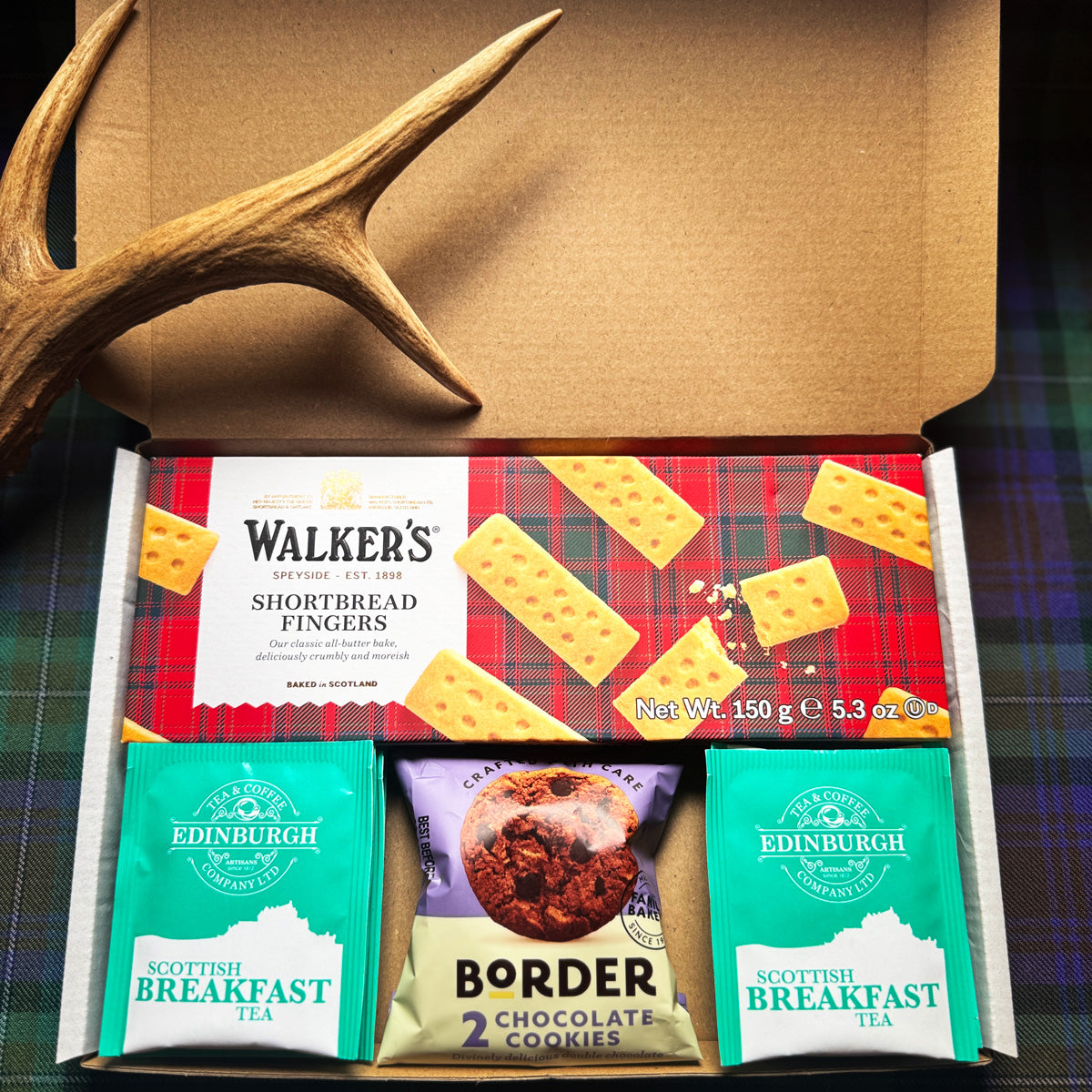 Scottish letterbox gift box with tea, shortbread and cookies
